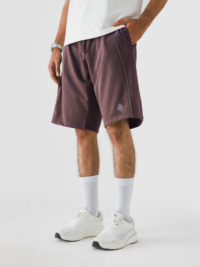 Man wearing Plum Aim Shorts, GROOVY men's sport and lounge shorts, Pakistan streetwear