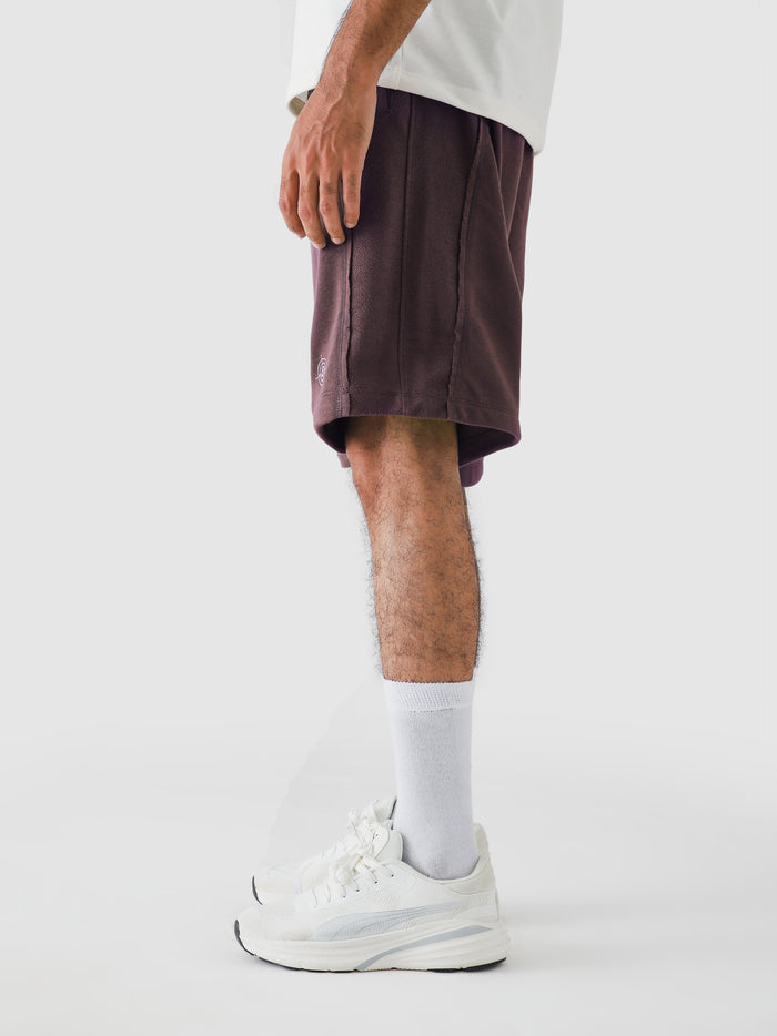 Plum Aim Shorts for men, breathable summer shorts for gym and daily wear by GROOVY Pakistan