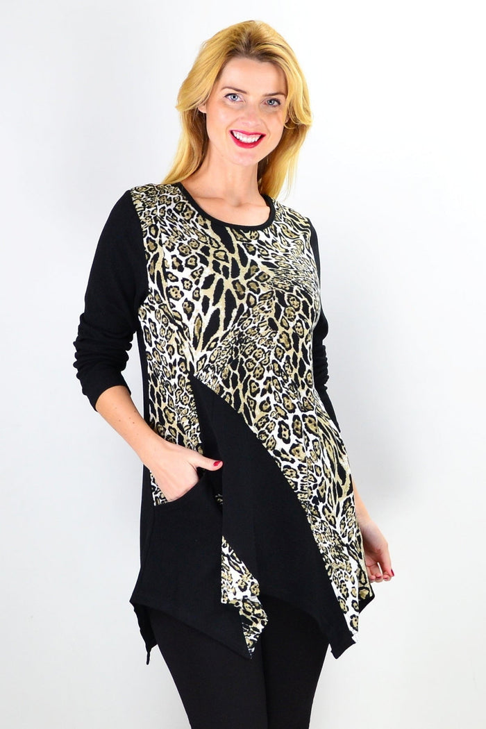 Animal print asymmetrical hem tunic top by Caroline Morgan, featuring bold animal pattern and stylish high-low hem design.