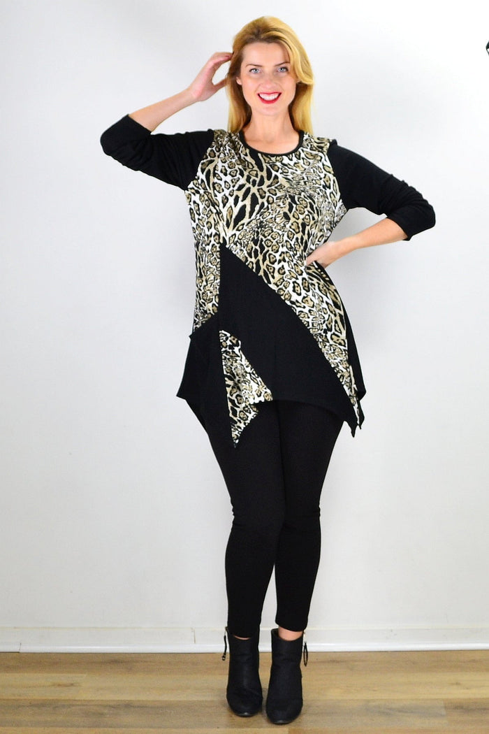 Animal print asymmetrical hem tunic top by Caroline Morgan, featuring a stylish animal pattern and a flowing, uneven hem design.