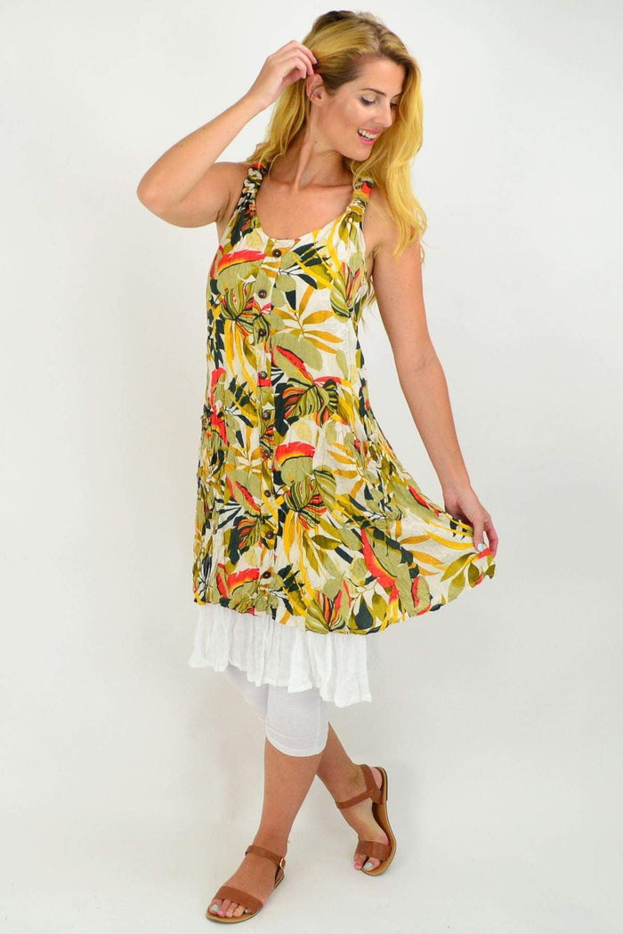 Missy Q Autumn Leaf Crinkle Tunic Dress showing a flowy, crinkled fabric with autumn leaf patterns in warm tones.