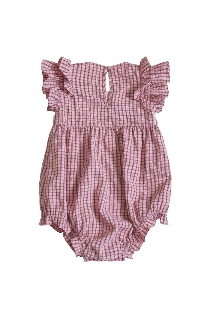 The Ivy City Co Baby Ana Romper in Pink & Brown Gingham, featuring flutter sleeves and a gathered waist, is displayed flat on a white background.