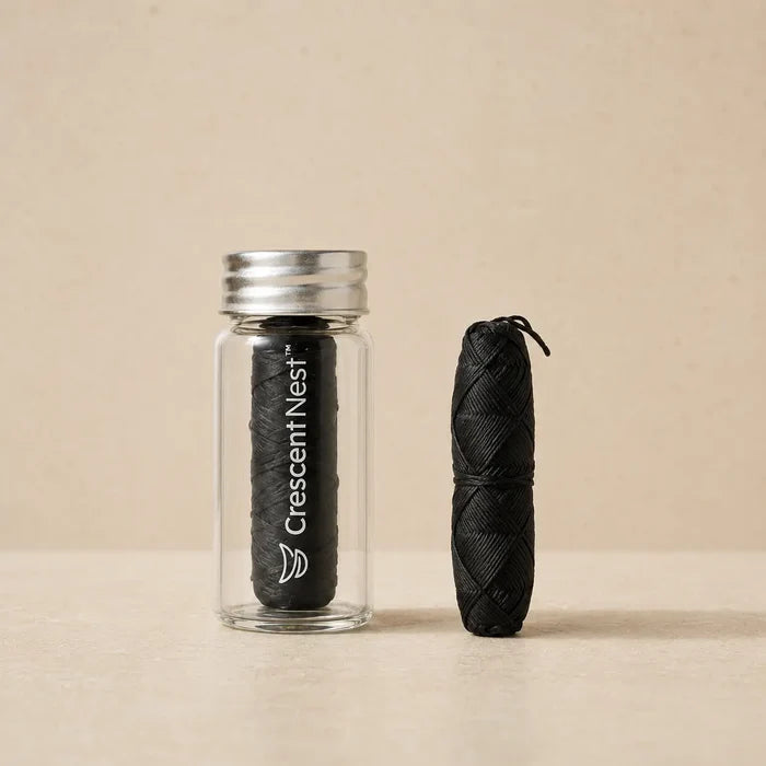 Reusable glass dental floss jar with a bamboo charcoal floss refill