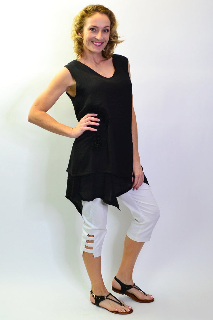 Black applique sleeveless tunic top by La Mode, featuring a stylish design, sleeveless cut, and elegant fabric for casual or dressy wear.
