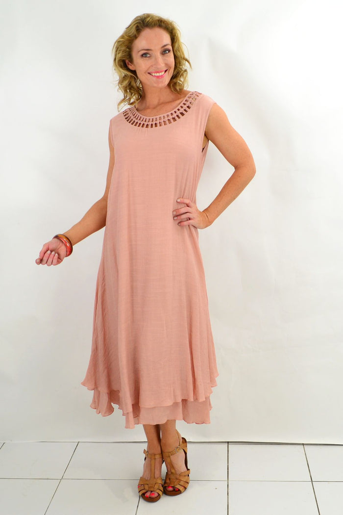 Grecian sleeveless blush tunic dress by La Mode featuring flowing fabric and elegant drape, suitable for casual or formal wear.