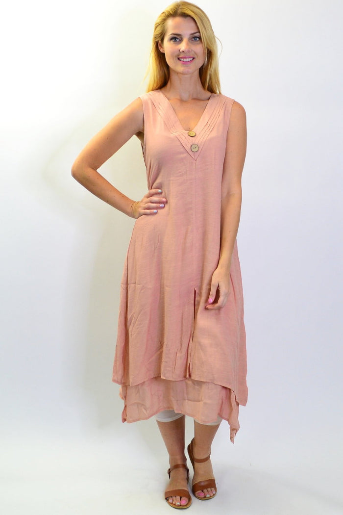 Blush pink sleeveless coconut button tunic dress from La Mode, featuring a relaxed fit and summer-ready style.