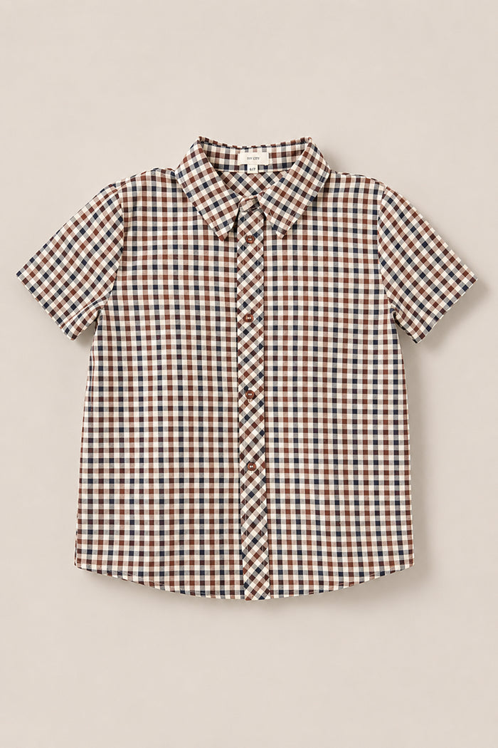 The Ivy City Co Boys James Shirt in Chestnut Gingham is a boys’ short sleeve shirt with a classic collar, featuring a brown, blue, and white gingham pattern on soft cotton fabric—perfect for any occasion.