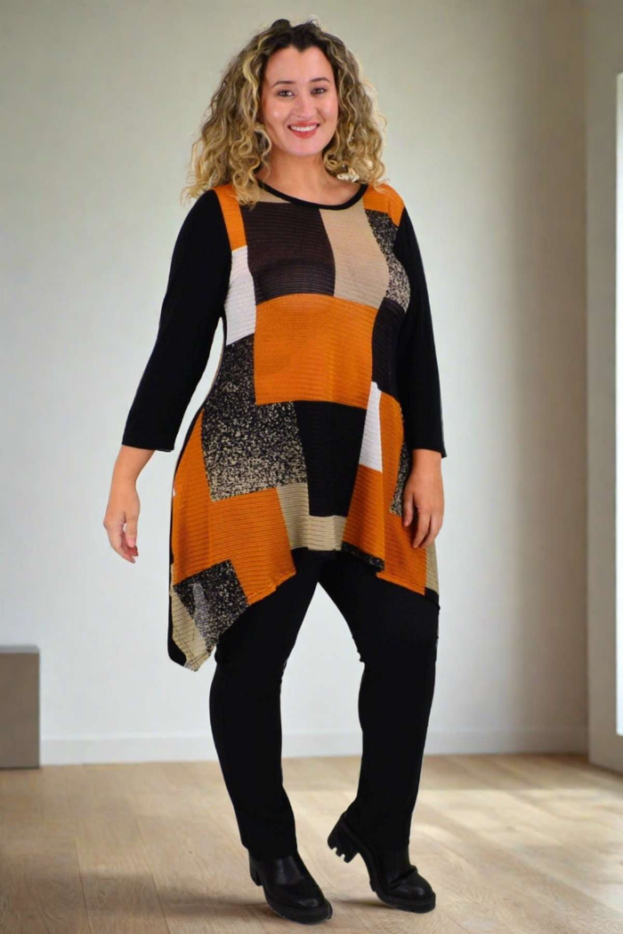 Caramel Caroline Morgan swing tunic top with flowy fit and long sleeves, displayed on a hanger.