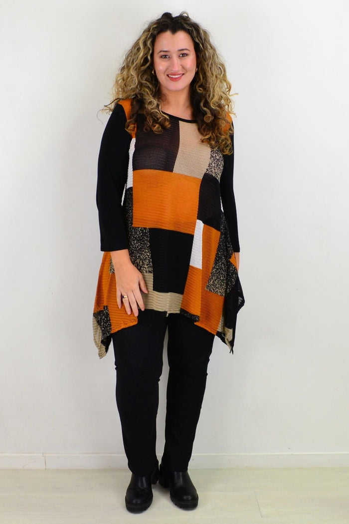 Caroline Morgan caramel swing tunic top displayed on a hanger with flowing fabric and a relaxed fit.