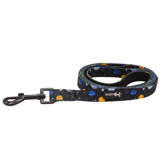 The Sassy Woof Dog Leash - To the Stars and Beyond features a space-themed pattern with planets and stars—perfect for girls in STEM or Girls Who Code who want to showcase their passion while walking their pup.
