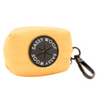 The Sassy Woof Dog Waste Bag Holder - Sunflower Fields is a yellow rectangular neoprene holder with a black circular logo and plastic clip, perfect for attaching to a leash or bag—an essential dog walking accessory.