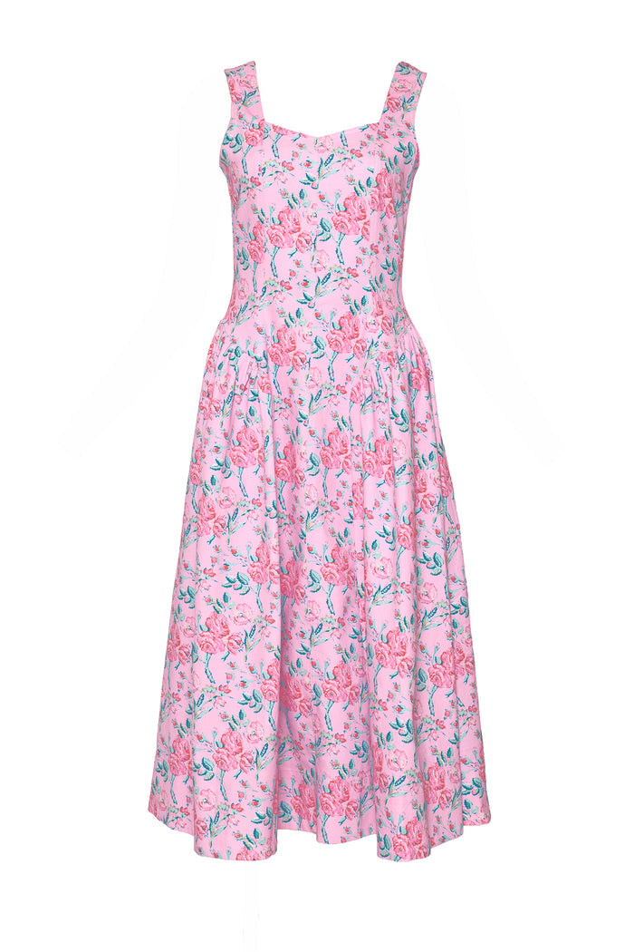 The Edith Dress in Pink Sketched Flower by Ivy City Co is a sleeveless midi dress with a fitted bodice, square neckline, and flared skirt, showcasing a charming pink and green floral print.