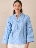 Elegant floral embroidery with a breathable woven cotton finish
