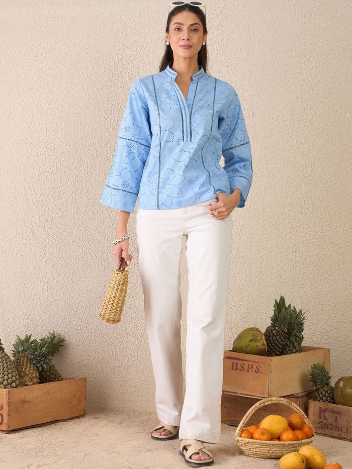 Elegant floral embroidery with a breathable woven cotton finish