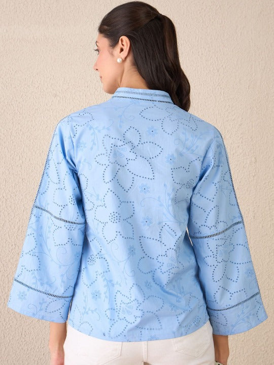 Elegant floral embroidery with a breathable woven cotton finish