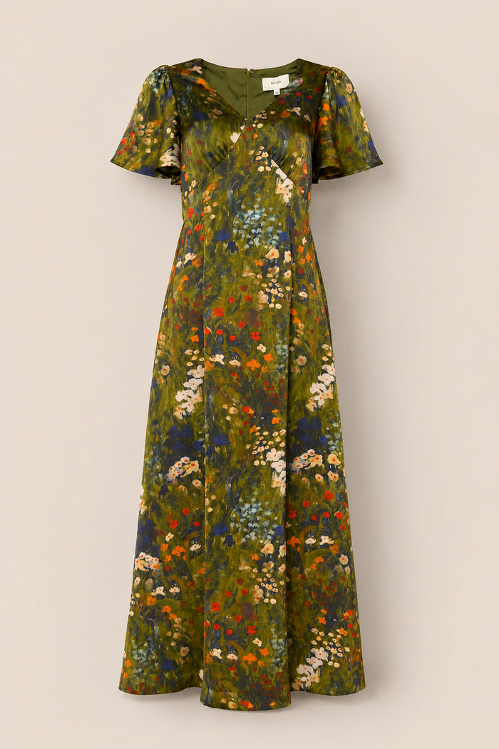 The Fiona Flutter-Sleeve Maxi Dress in Impressionist Bloom by Ivy City Co features a green satin fabric, short flutter sleeves, and a colorful floral pattern in shades of orange, white, and blue. It is displayed on a plain background.
