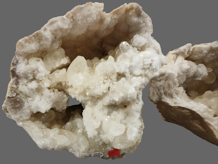 Crystal formation on a white surface with a blurred background