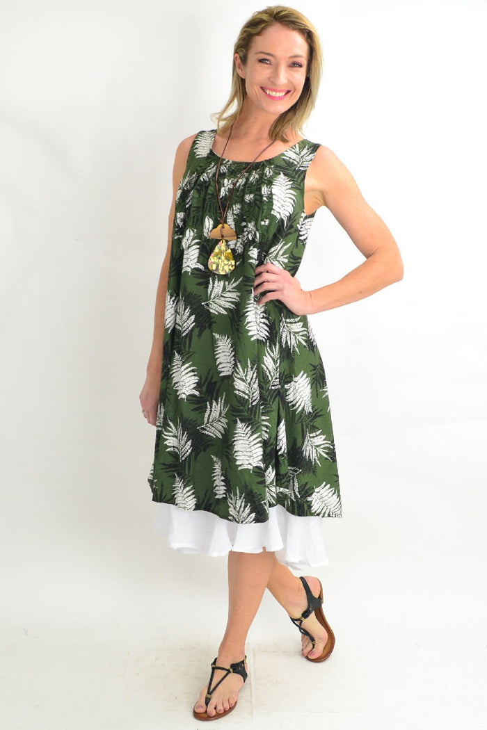 Green frilly Fern Willow Tree tunic dress with ruffled details, flowing fabric, and botanical-inspired design.