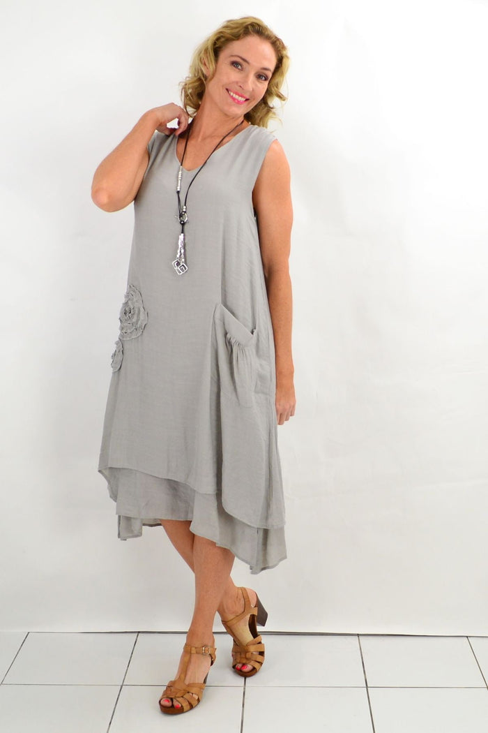 Grey sleeveless cotton tunic dress with applique details from La Mode, shown on a model highlighting its relaxed fit and stylish design.