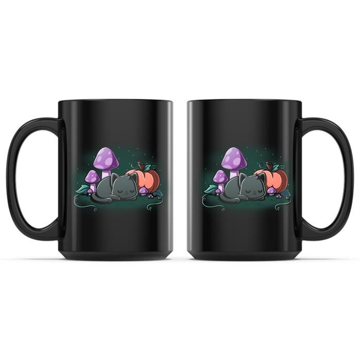 Ceramic Mug_TeeTurtle Harvest Haze Mug black mug featuring a sleeping black cat curled up beside a pumpkin and purple mushrooms in a peaceful autumn woodland scene.