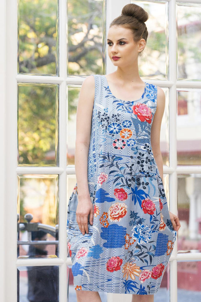 Himeji Bubble Tunic Dress by I Love Tunics in light fabric with a relaxed fit and bubble design, displayed on a hanger.