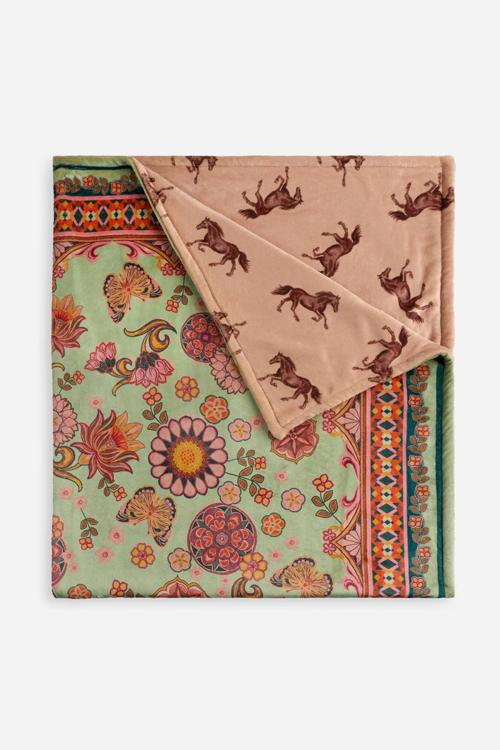 floral blanket with horses
