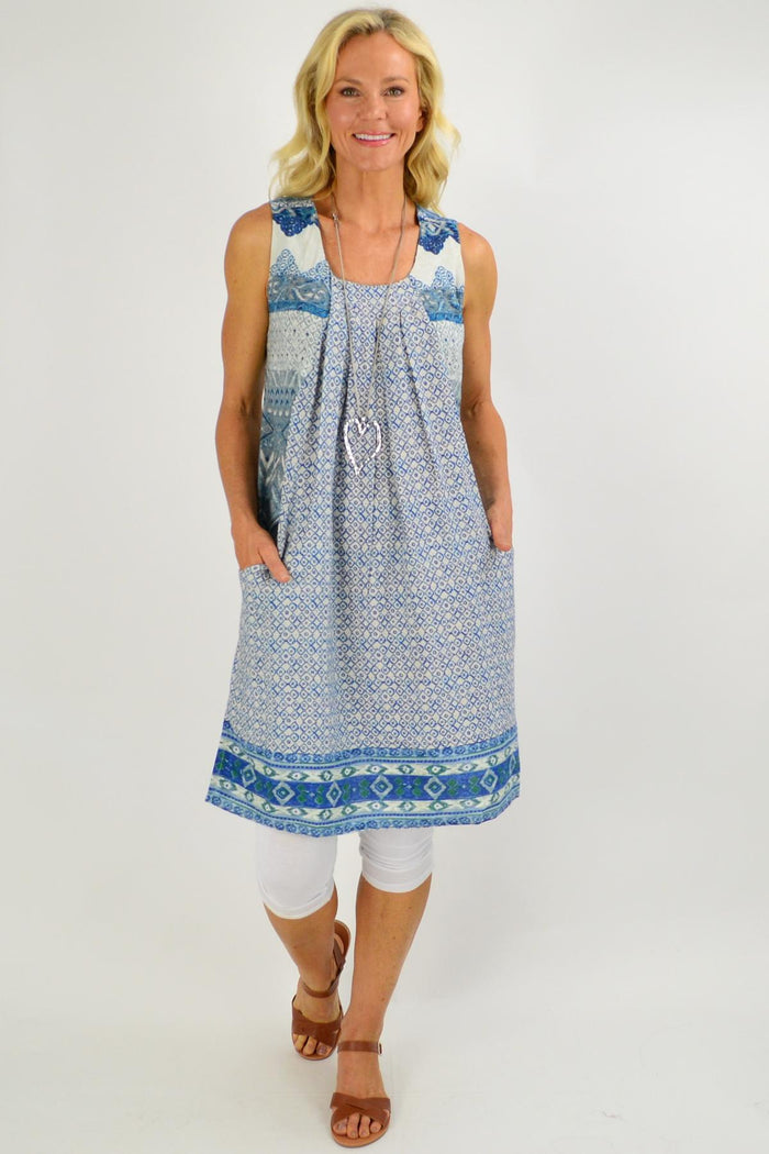 Blue Leon Pleat Pocket Tunic Dress by Orientique featuring a relaxed fit, pleated details, and side pockets for casual style.