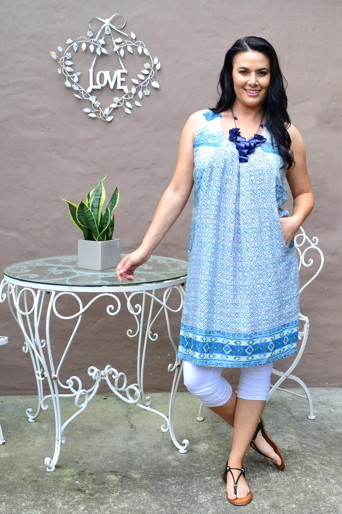Blue Leon Pleat Pocket Tunic Dress by Orientique, featuring a relaxed fit and stylish pleats with functional pockets.