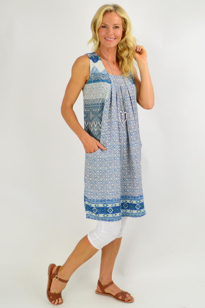 Blue Leon Pleat Pocket Tunic Dress by Orientique, featuring a relaxed fit, pleats, and side pockets, perfect for casual wear.