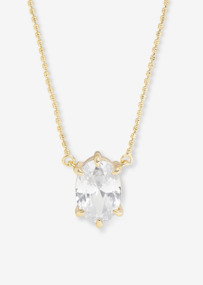 Gold simulated diamond pendant neckline on a white background