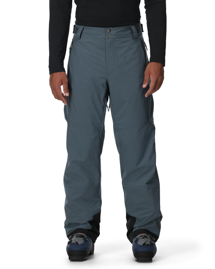 Person wearing dark gray pants on a white background