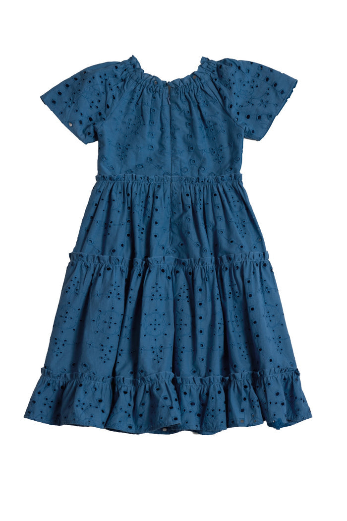 The Mini Etta Dress in Cobalt by Ivy City Co is a knee-length, short-sleeve girls' cotton dress with ruffle details and an eyelet pattern, shown laid flat on a white background—perfect for matching mom and me moments.