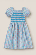 The Mini Sunday Best Dress in Rosette Linear Stripe by Ivy City Co features puff sleeves, a smocked bodice, and a gathered skirt with pink and white floral patterns—ideal for Mom and Me matching moments.