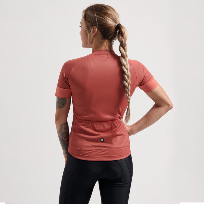 Rogelli Modesta fietsshirt dames koraal korte mouw gedragen achterkant.