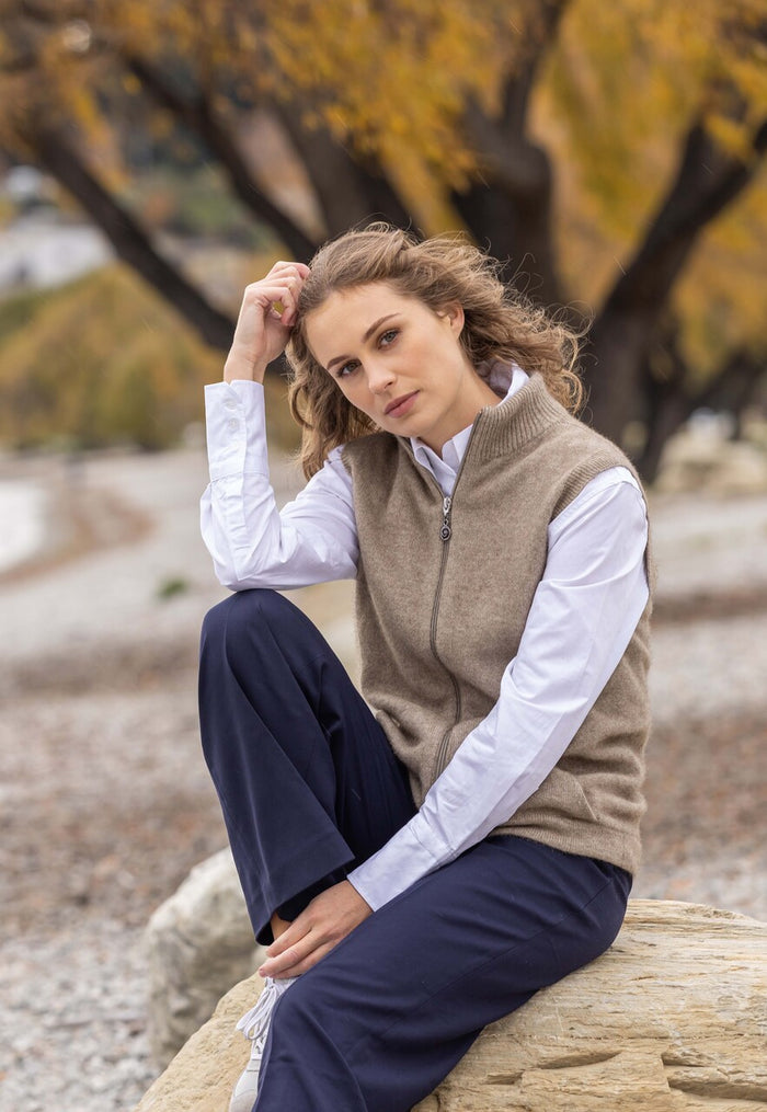 Woman wearing Noble Wilde - Merino & Possum Gilet Zip Vest (NW3101) in the colour Oyster.