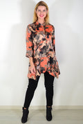 Orange beige satin tunic shirt by Caroline Morgan, featuring a relaxed fit with elegant drape and subtle sheen, shown on a model.