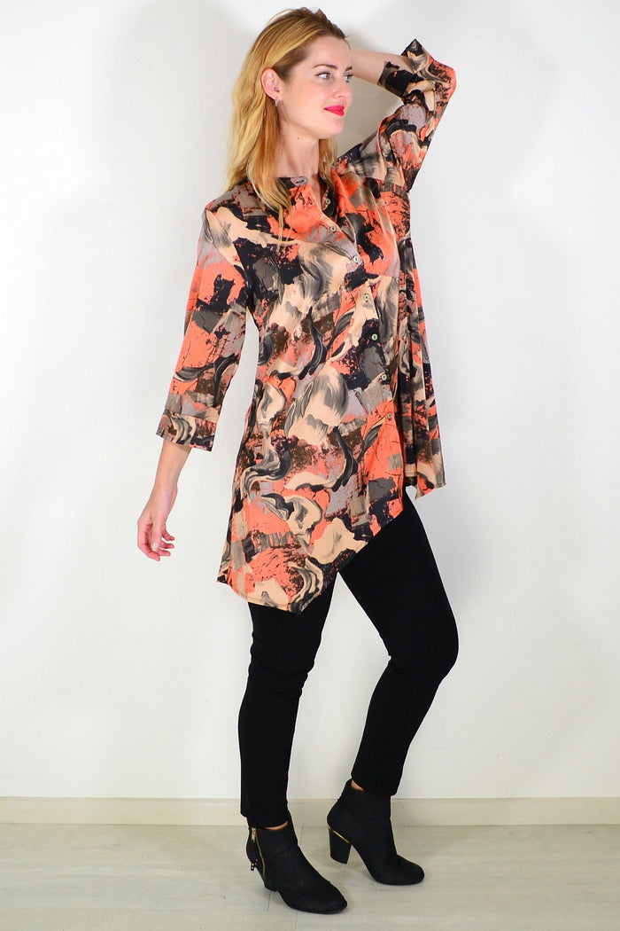 Orange beige satin tunic shirt by Caroline Morgan, featuring a smooth, shiny fabric and a relaxed fit.