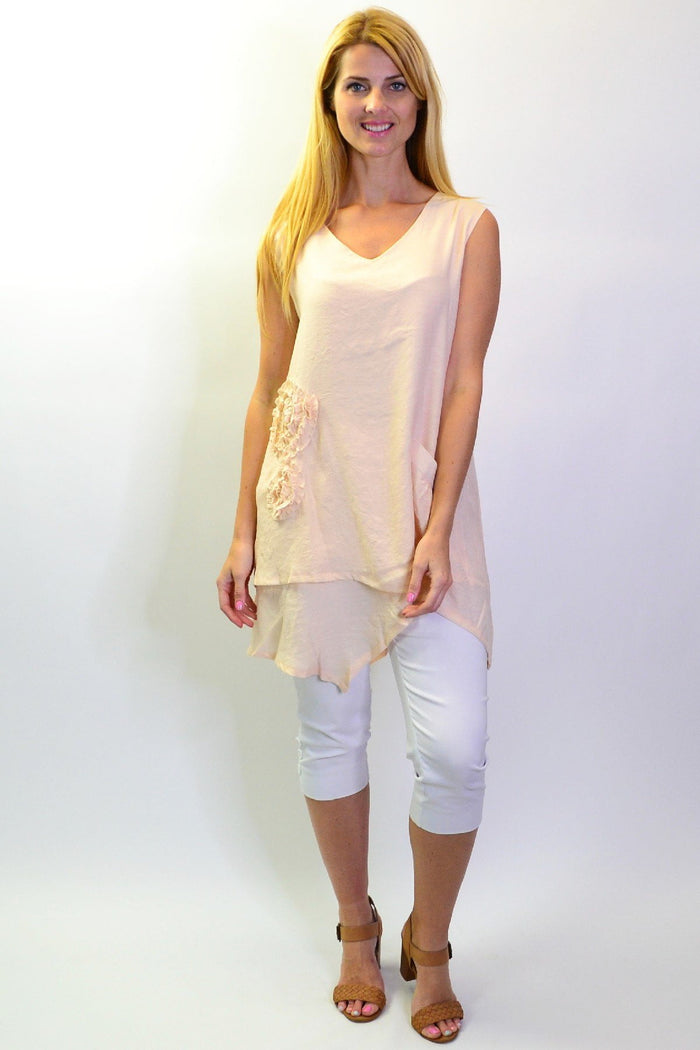 Peach sleeveless tunic top with appliqué details from La Mode, stylish and comfortable for casual wear.