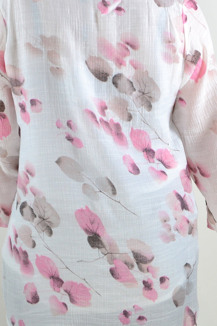 Pink floral botanical tunic top by Caroline Morgan, showcasing lightweight fabric and vibrant floral design.
