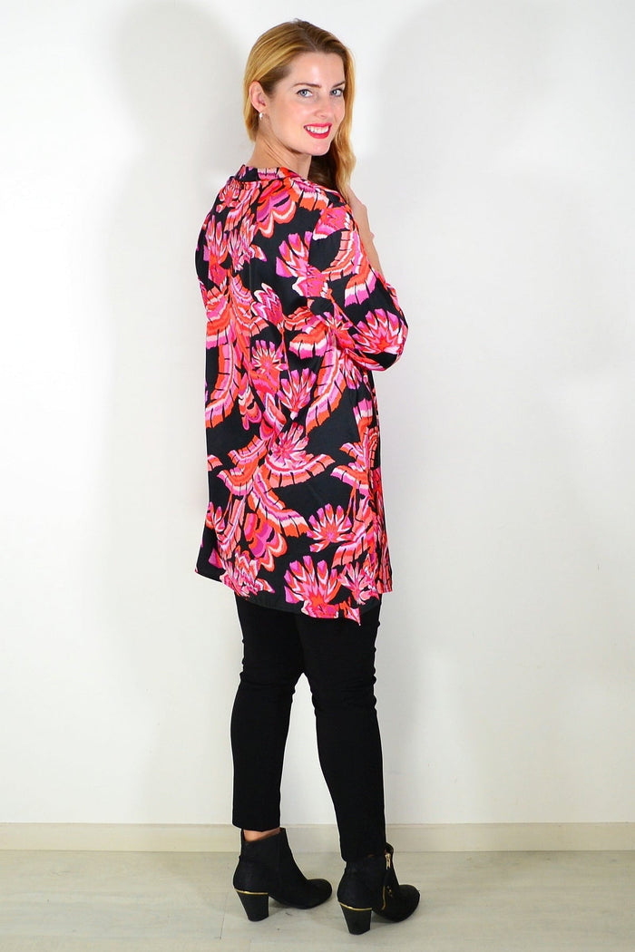 Pink orange satin tunic shirt by Caroline Morgan, featuring a flowy design and elegant fabric texture.