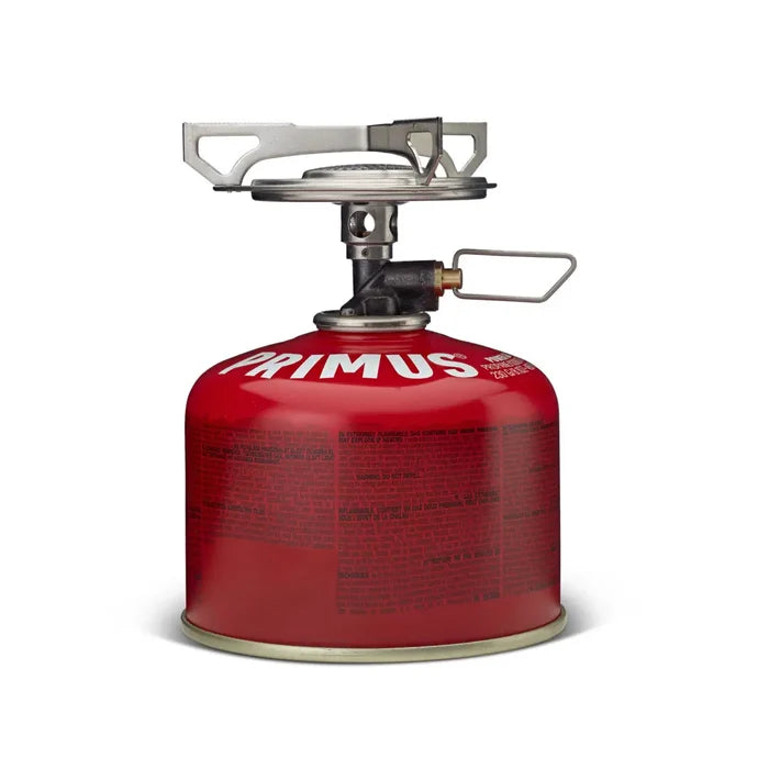 Primus Essential Trail Camping Gas Stove attached to a Primus Power gas  canister on a white background