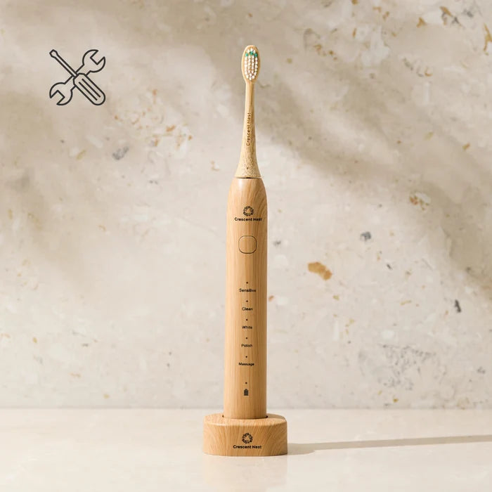 bamboo electric toothbrush on a light background with a tool icon.