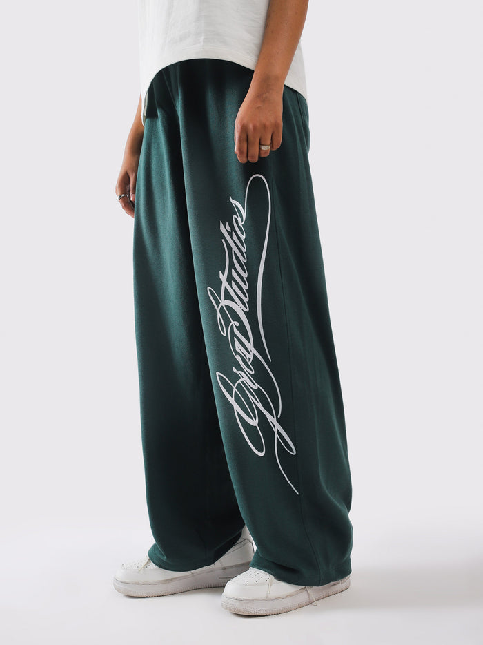 Script Sweats baggy leg stacking over a sneaker - GROOVY Pakistan