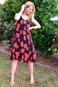 Red and black sleeveless Shapes A line shift tunic dress by Cordelia St, featuring a relaxed fit and stylish design.