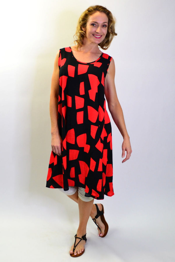 Cordelia St Shapes A line Shift Tunic Dress hanging on a hanger with a simple, elegant silhouette and soft fabric.