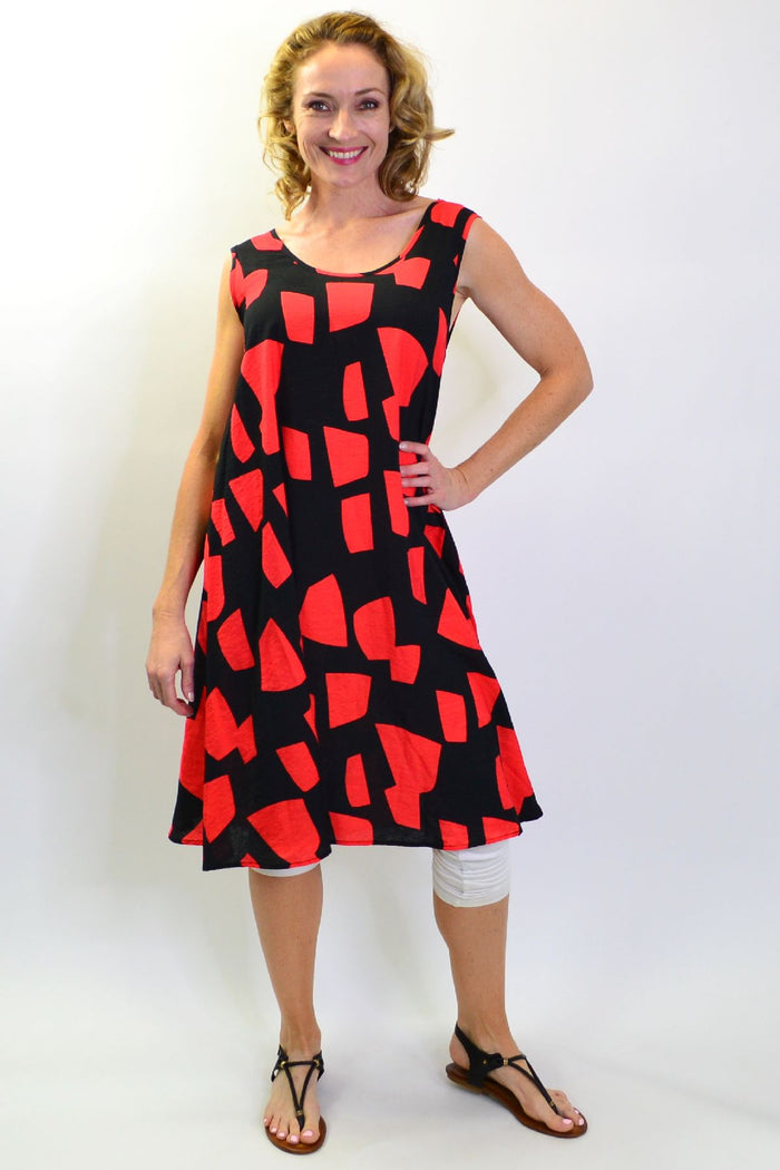 Cordelia St Shapes A line Shift Tunic Dress hanging on a hanger, showing its relaxed fit and simple, elegant design.