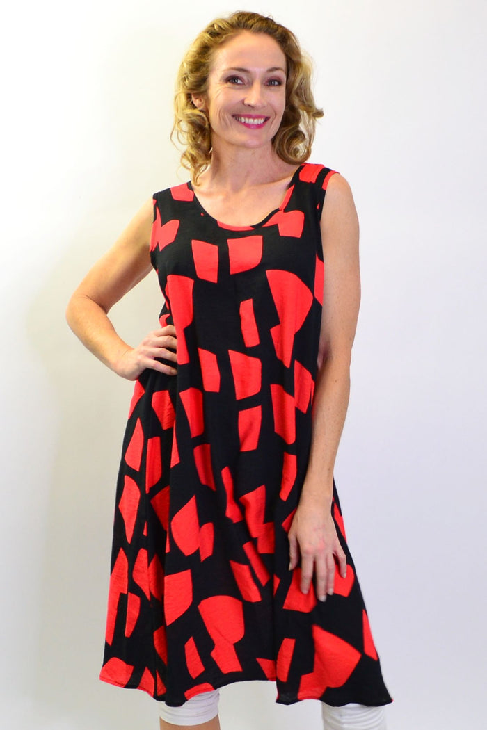 Cordelia St Shapes A-line Shift Tunic Dress hanging on a display, showcasing its relaxed fit and simple design.
