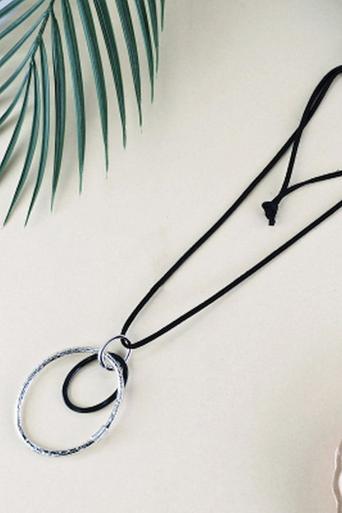 Silver black oval rings pendant necklace featuring a sleek oval design, crafted by I Love Tunics for a stylish look.