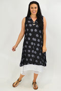 Sleeveless black dots overlay tunic dress by La Mode, featuring a flowy silhouette and stylish design perfect for casual wear.