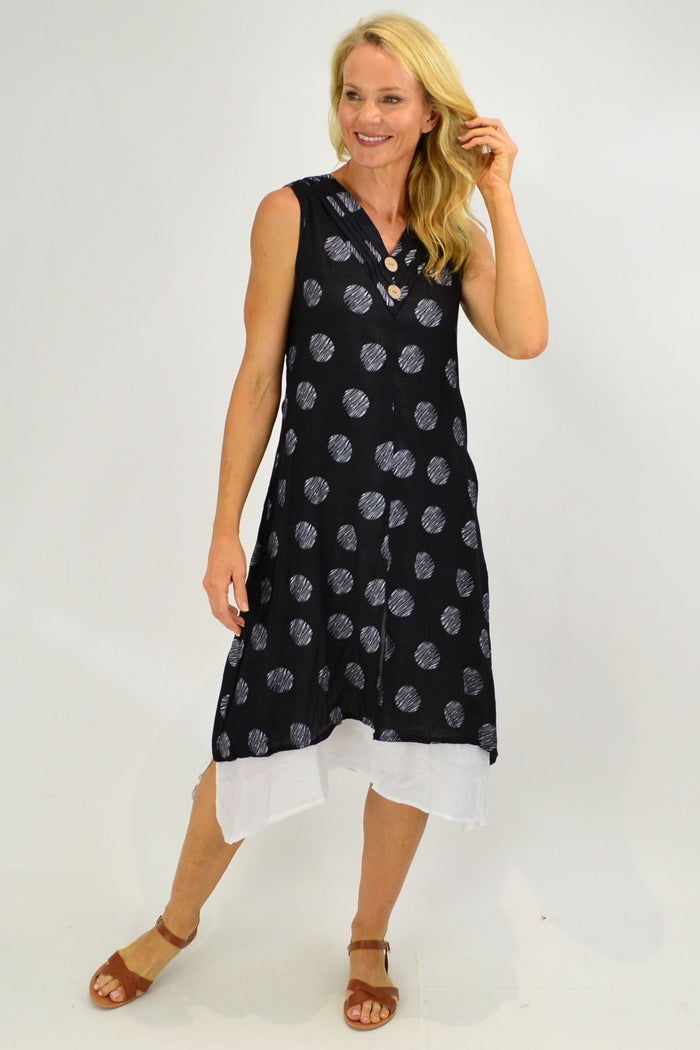 Sleeveless black tunic dress with white dot overlay from La Mode, stylish and comfortable for casual wear.